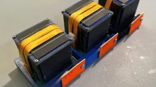 The ERMINAZ-2V, ERMINAZ-2X and ERMINAZ-2U PocketQube satellites photographed before their October 1 launch.