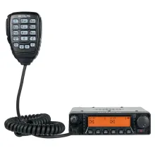 A Retevis GMRS mobile radio with its hand microphone, showing the channel display on the front panel.